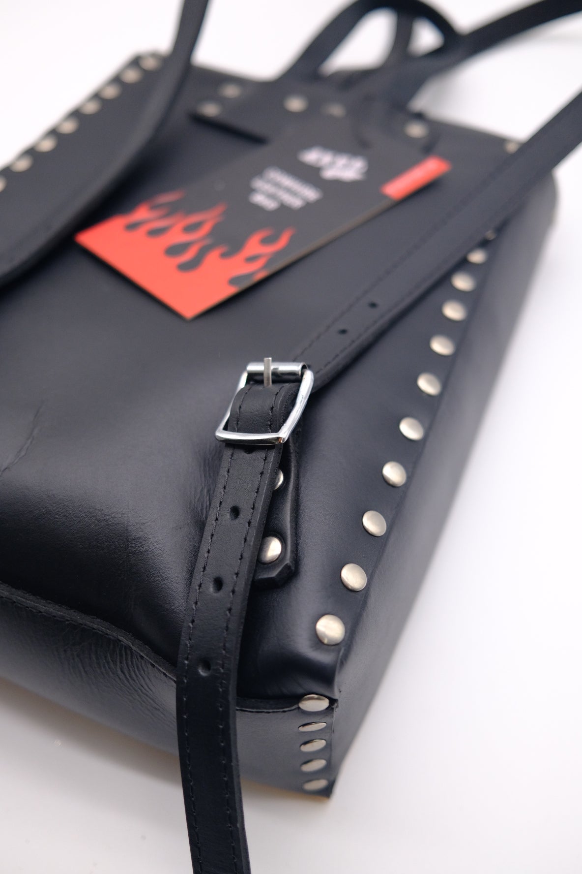 Studded leather Axel Co Backpack with adjustable straps