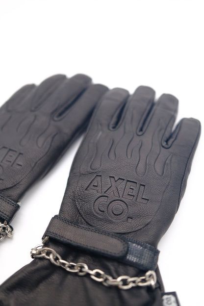 Black Gauntlet gloves with 'AXEL CO.' branding on a white background