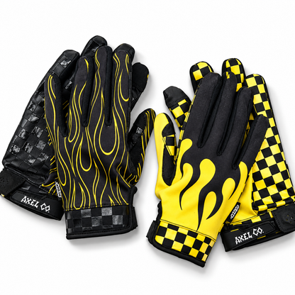 Axel Co flame dirt bike gloves in black with yellow checkers and yellow pin-striped flames